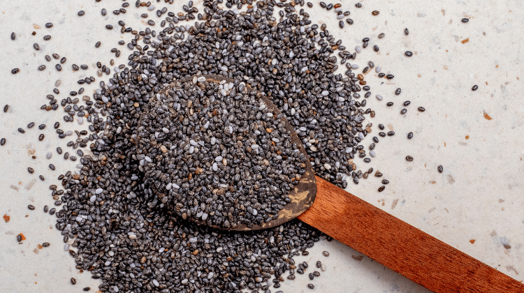 chia seeds in spoon at table