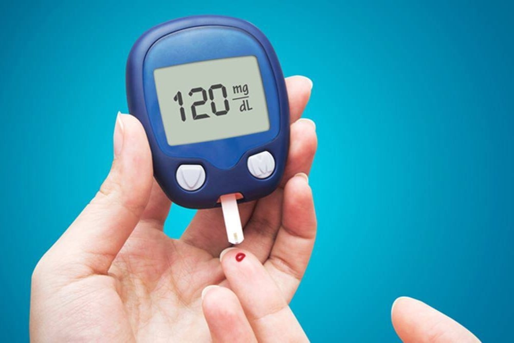 sugar meter showing the result of blood sugar of a daibetic
